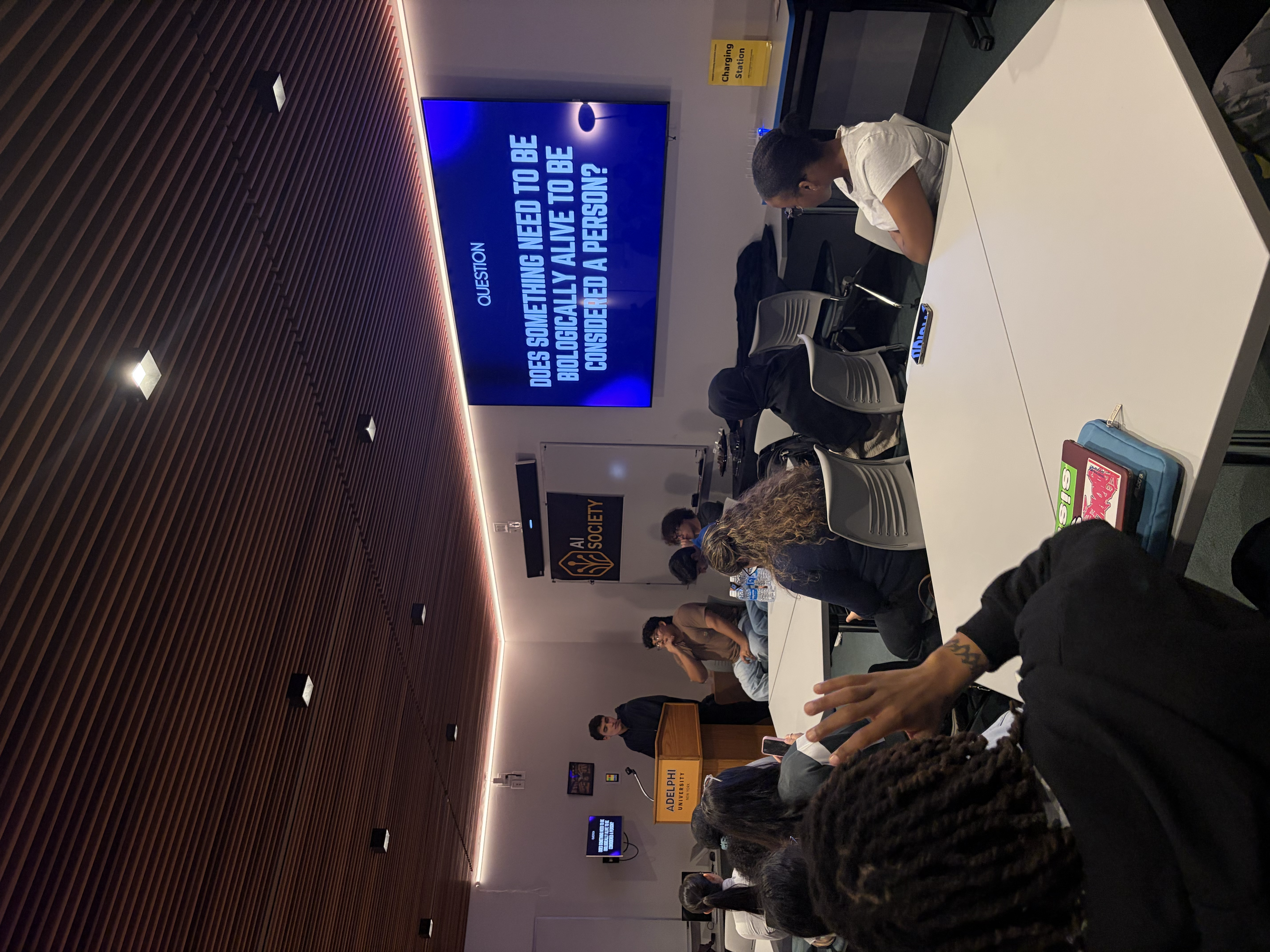 Packed room of students, professors, and administration at the Adelphi AI Society Fall 2026 AI Debate