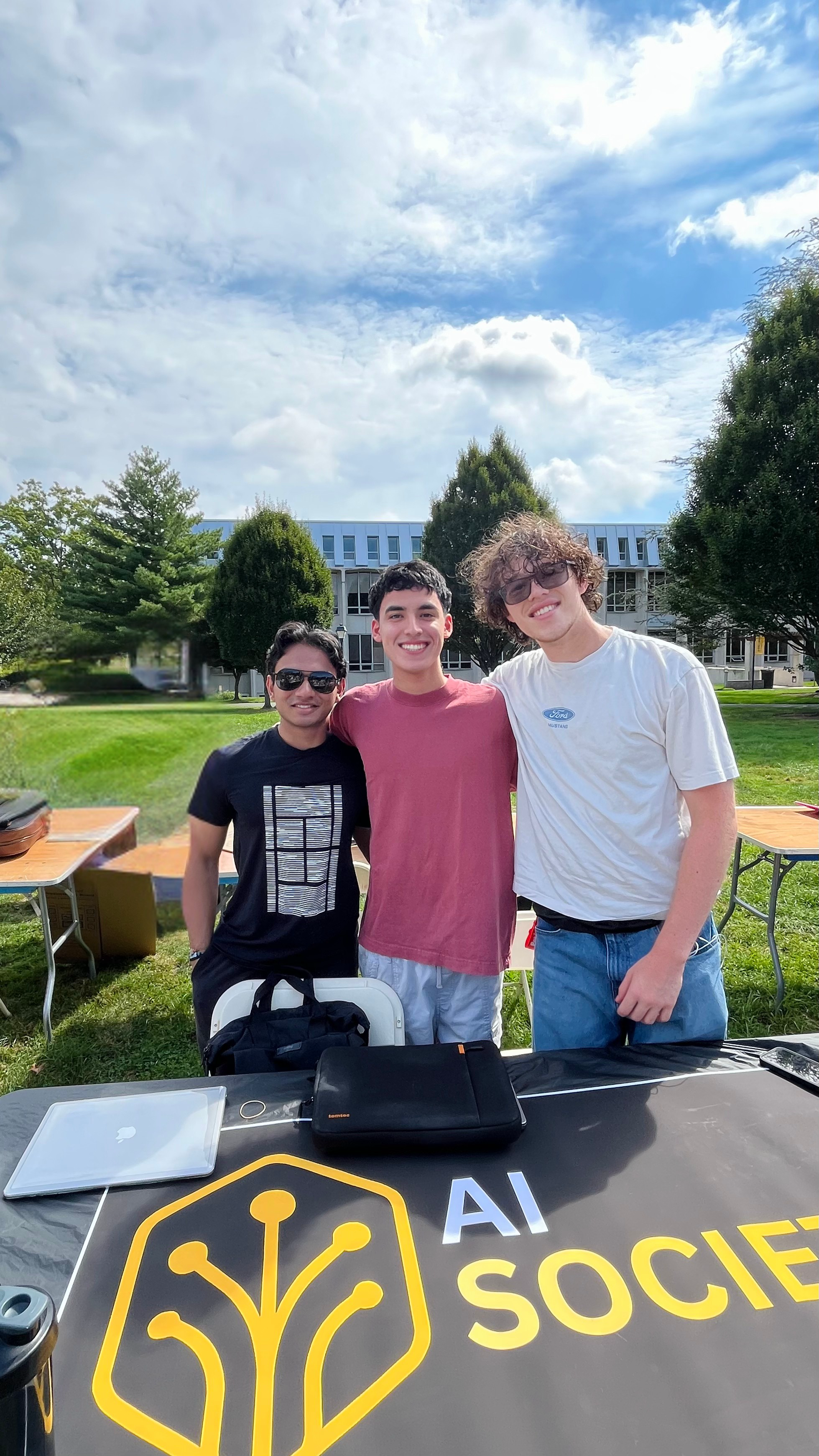 Santiago Rodriguez representing the Adelphi AI Society at the campus club fair in Fall 2026