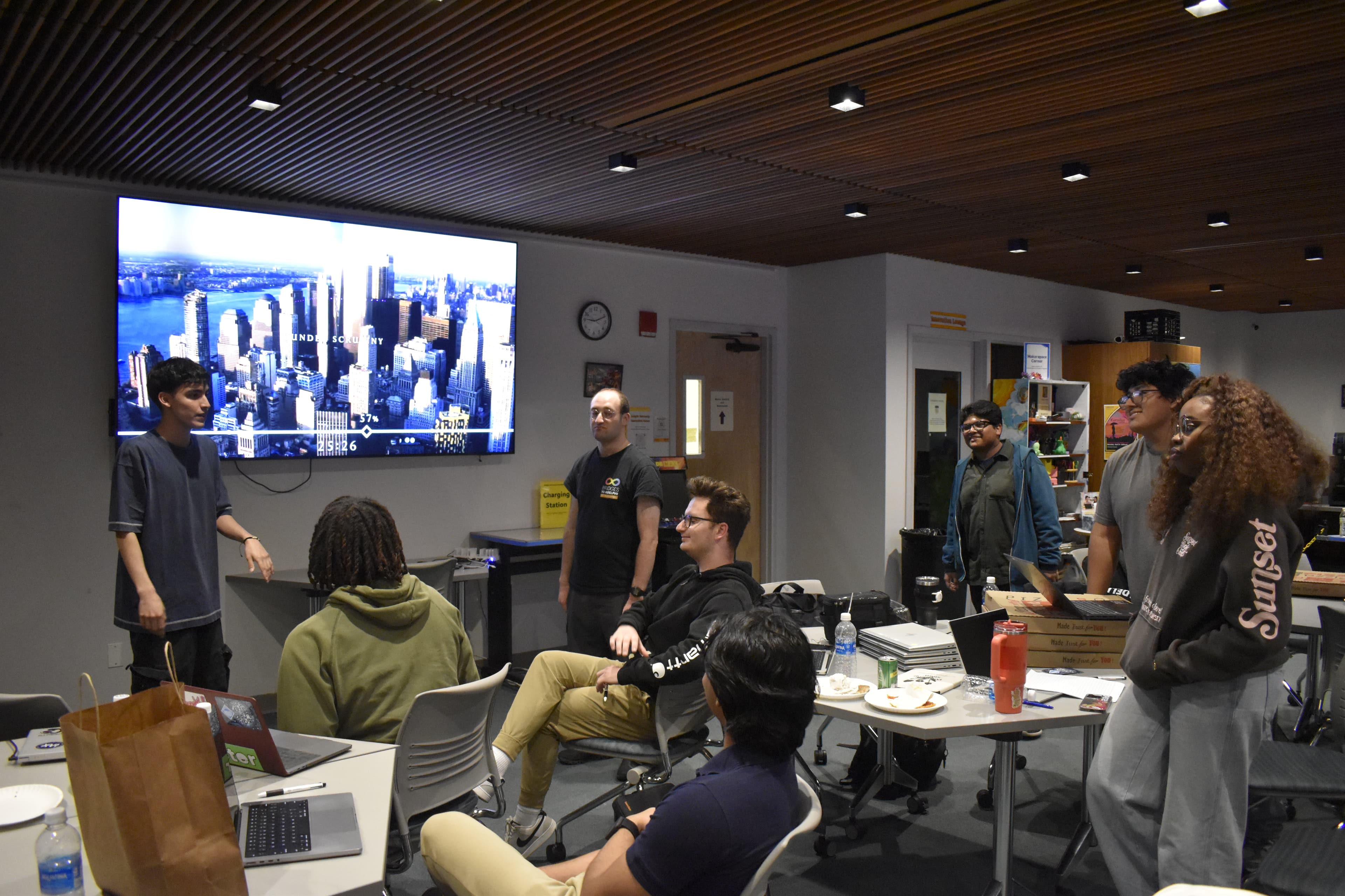 Santiago Rodriguez leading the Adelphi AI Society at Adelphi University